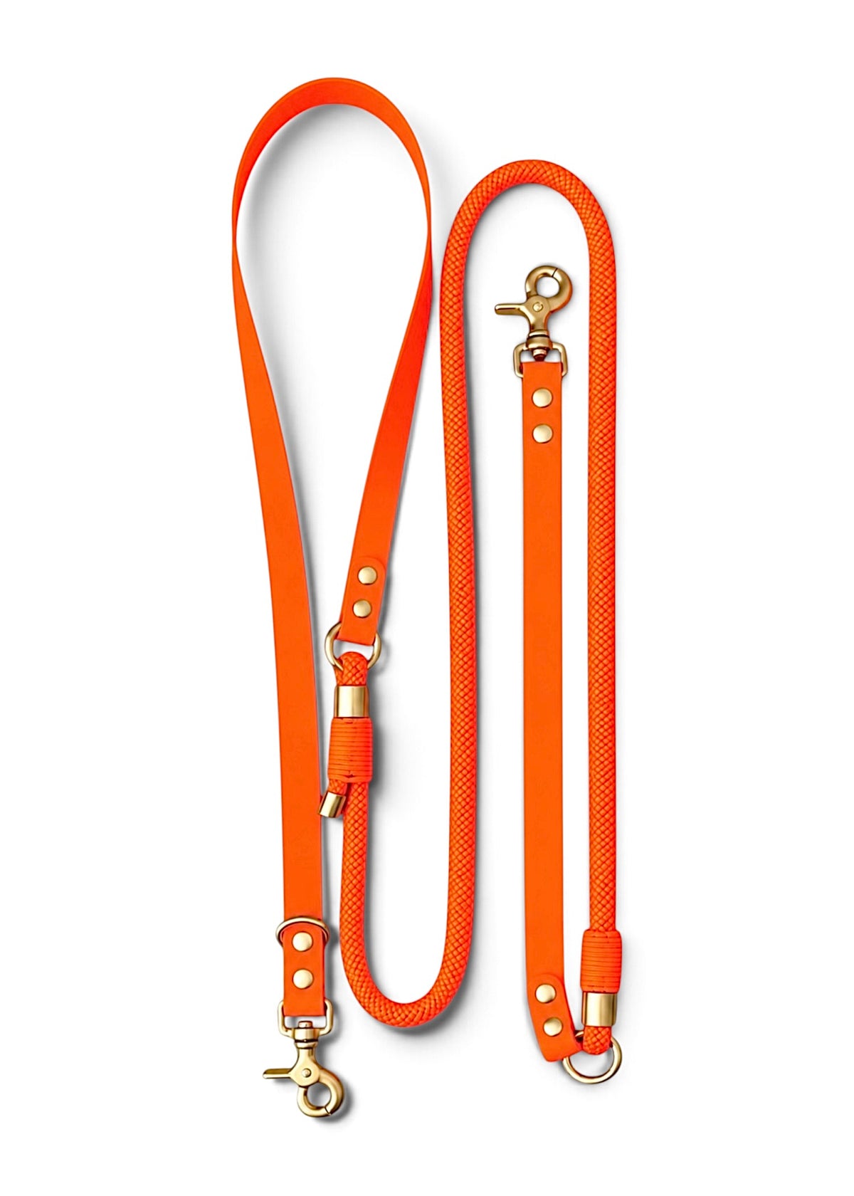 Laisse multi-positions pour chien en Biothane et paracorde orange néon Orange Mécanique par la marque française PLI Paris.